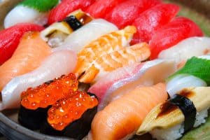 a plate of colorful sushi